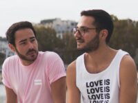 Two men sitting outdoors