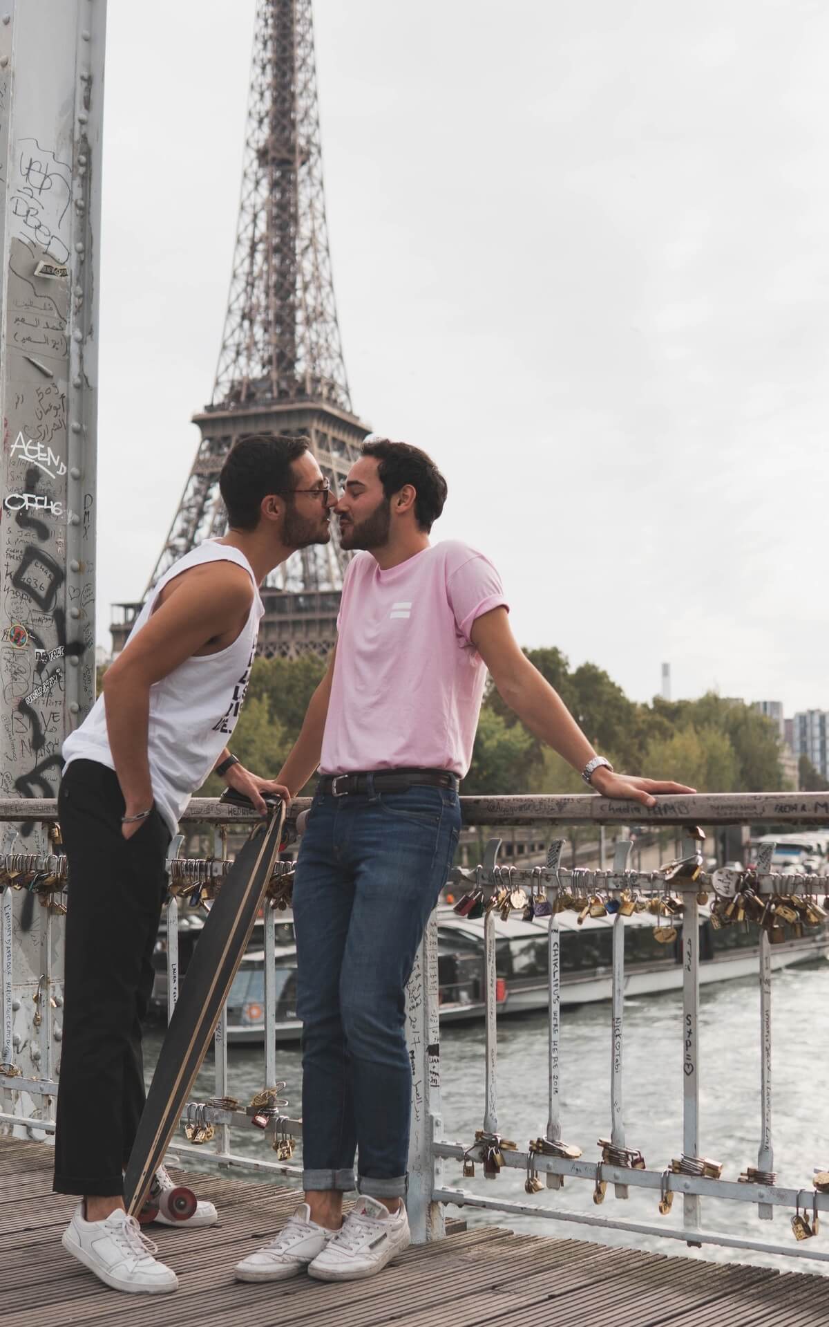 Two men standing at railing in Paris