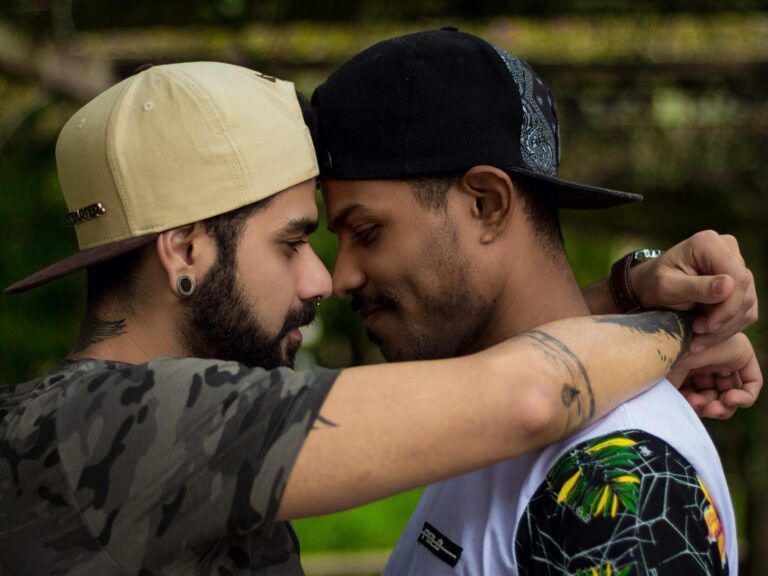 Gay couple facing each other