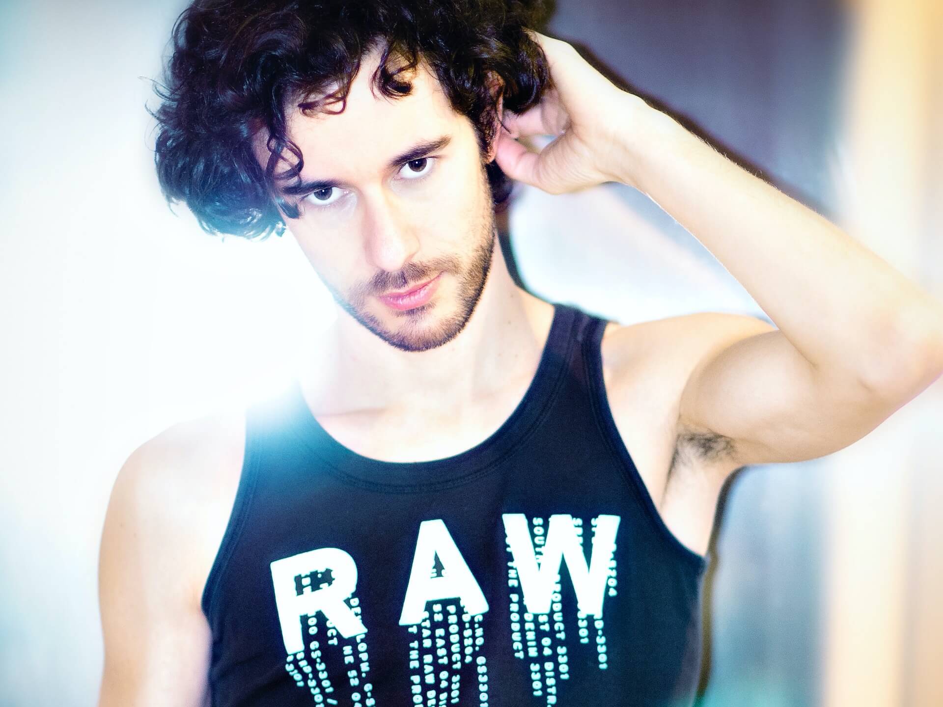 Man Wearing RAW Tank Top Man wearing RAW tank top
