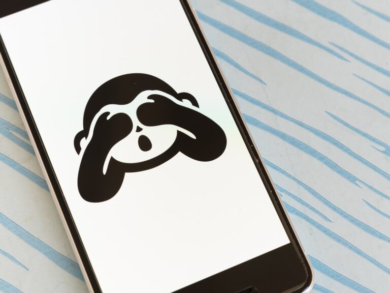 Covered eyes emoji on smartphone