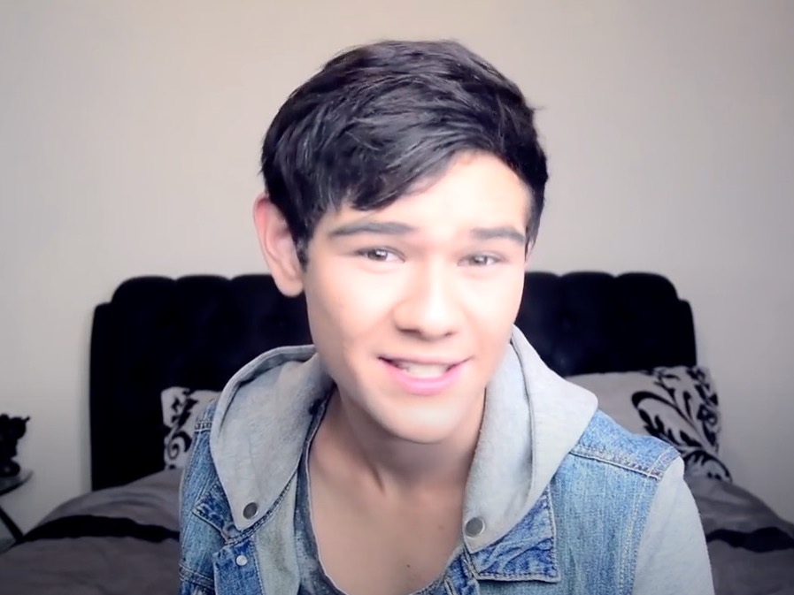 Young gay man headshot speaking to camera
