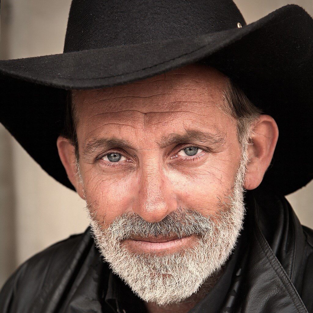 Bearded man in cowboy hat