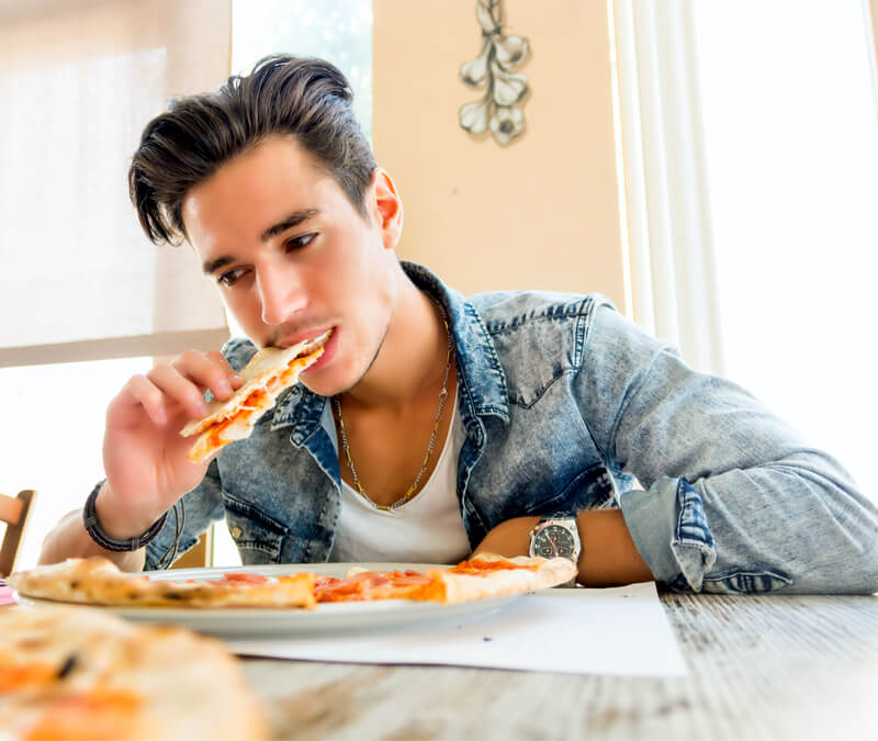 Man Eating Pizza Man eating pizza