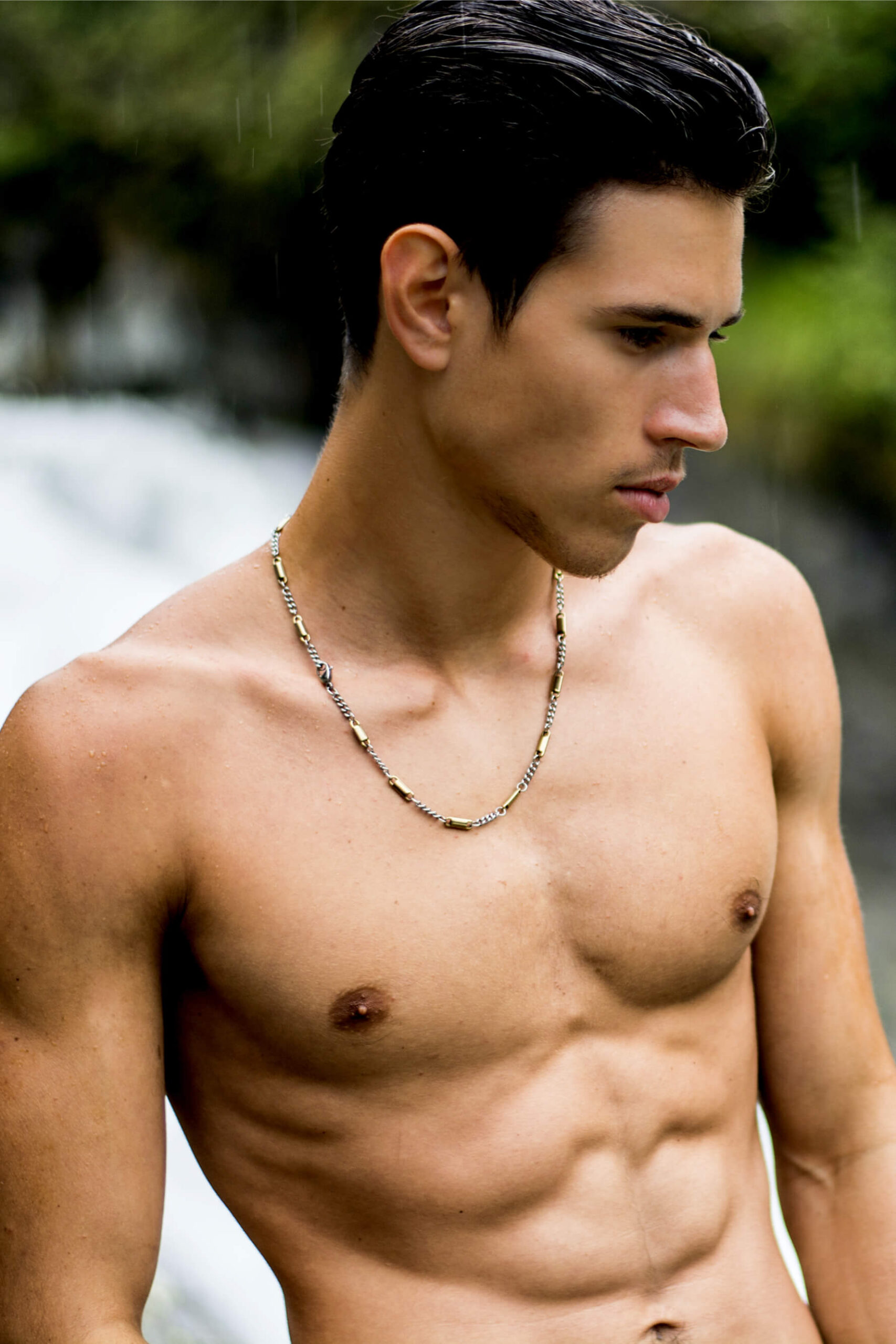 Shirtless man profile outdoors