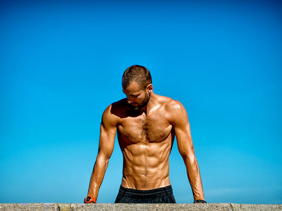 Sinewy Athletic Shirtless Man at Wall Sinewy athletic shirtless man at wall