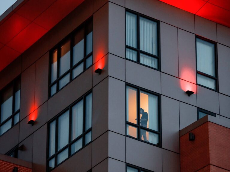 Man alone in window