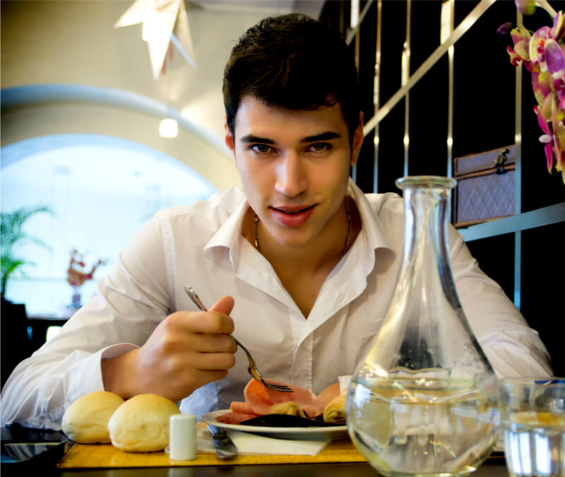 Man in Restaurant Eating Antipasta Man in restaurant eating antipasta