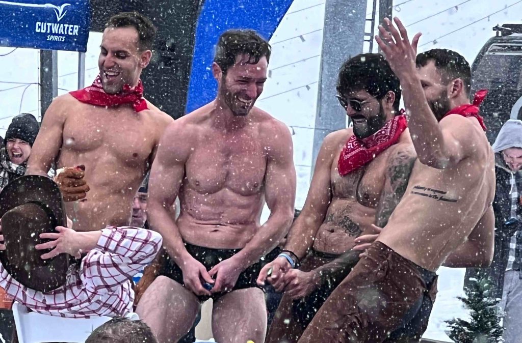 4 Shirtless Après-Ski Guys in the Snow 4 shirtless guys laughing at Après-Ski in snowstorm
